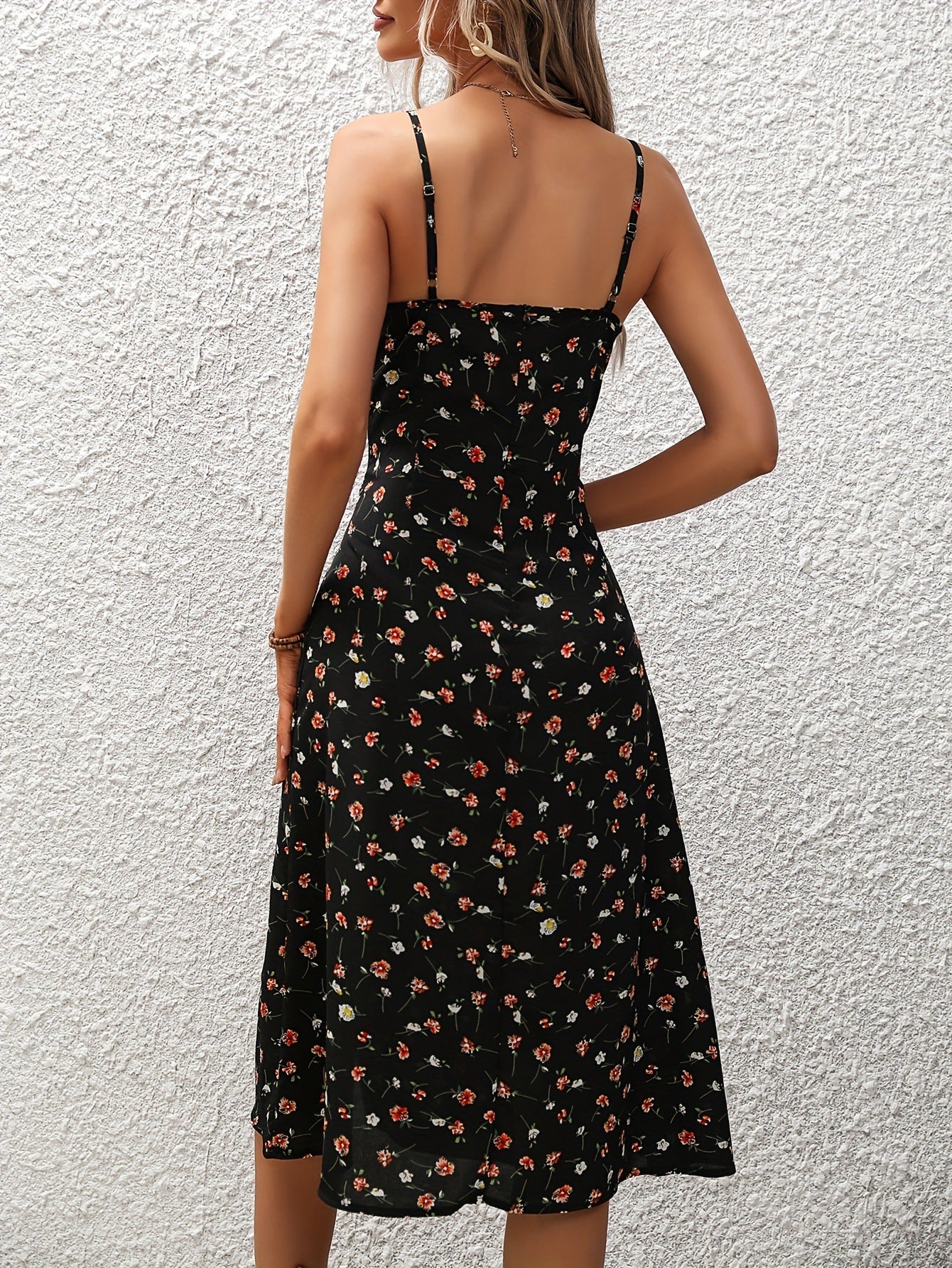 Robe longue à pois fendue et élégante pour l'été